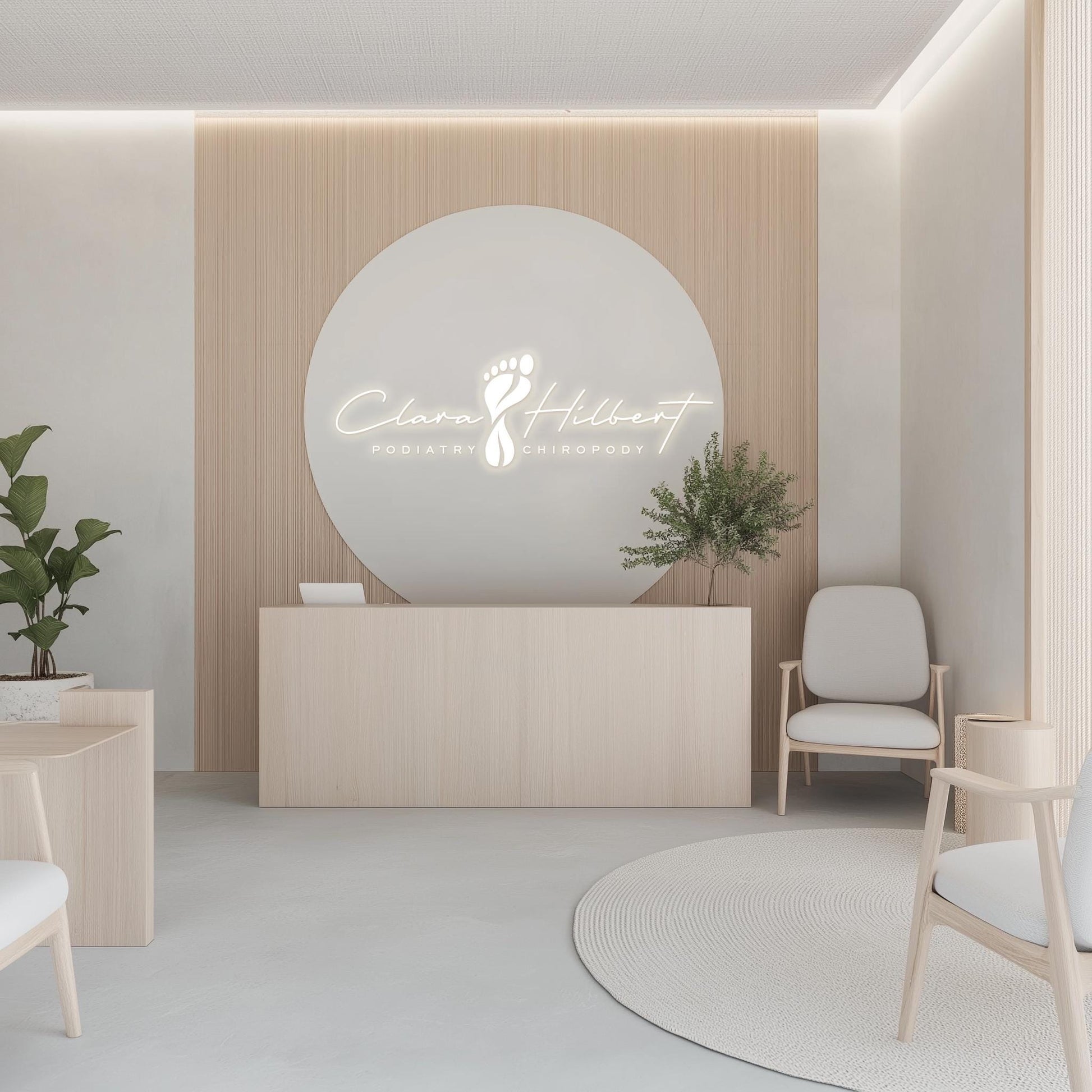 Foot clinic reception with a professional podiatry logo displayed as a sleek illuminated sign on a modern, neutral-toned wall.