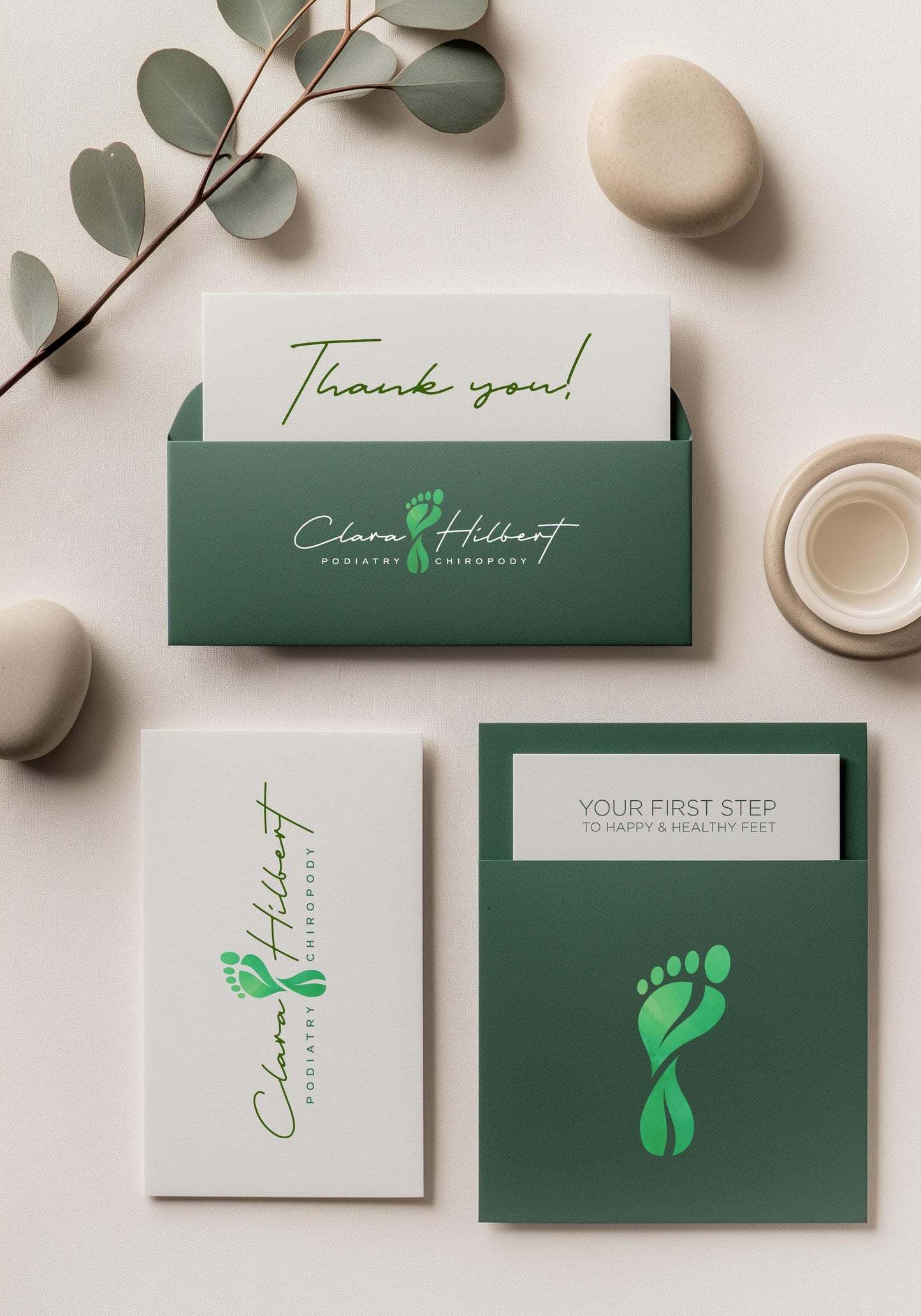 Foot clinic reception with a professional podiatry logo displayed as a sleek illuminated sign on a modern, neutral-toned wall.